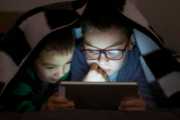 Kids playing on a tablet pc